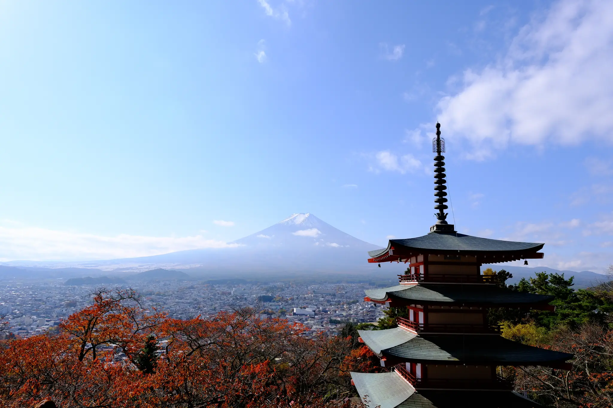 Chureito Pagoda with Mt. Fuji and autumn trees behind